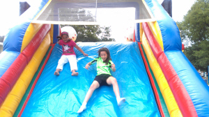 Air Castles And Slides party rentals central NJ Two girls race down the Obstacle Slide. Nothing cools like a summer water slide! Dry slides are also avaiable by themselves or as part of a combo unit or obstacle course. Slides come in many themes - find your favorite design!