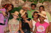 Themed photo booth helps to create memories. Hats bring the group theme together for the photos.
